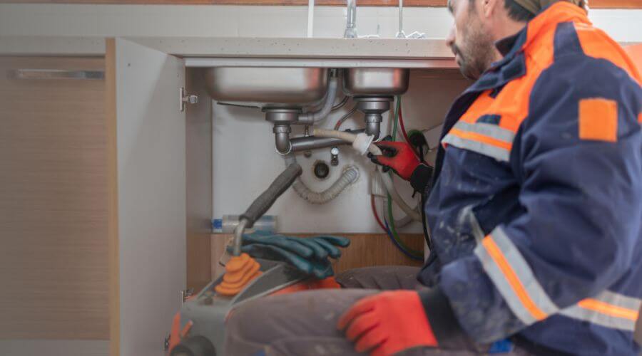 Professional slab leak plumber services in Elsmore, KS